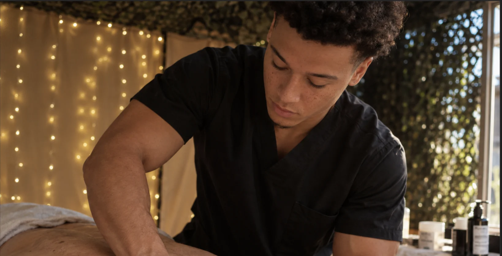 Coby providing a personalized massage treatment